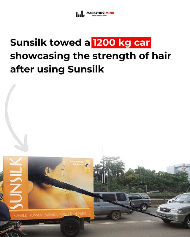 Sunsilk hiện thực hóa ý tưởng quảng cáo OOH táo bạo: dùng bím tóc thay thế cáp thép, kéo cả xe cứu hộ. Ảnh: Internet